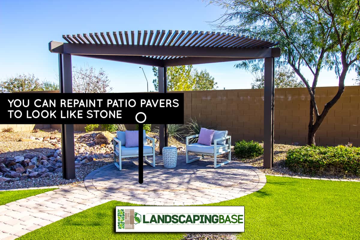 Back Yard Pergola With Two Arm Chairs On Pavers, Can You Paint Patio Pavers To Look Like Stone?