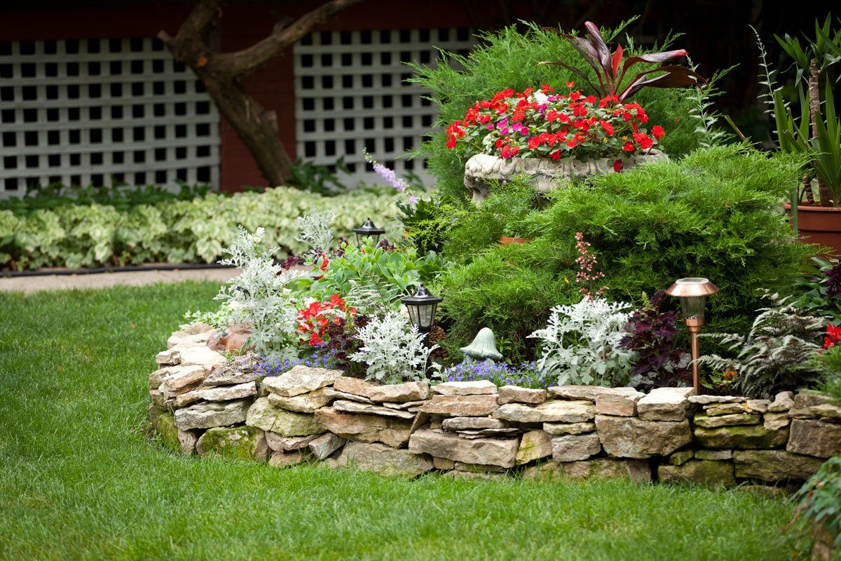 Gorgeous center island garden with rocks serving as the base