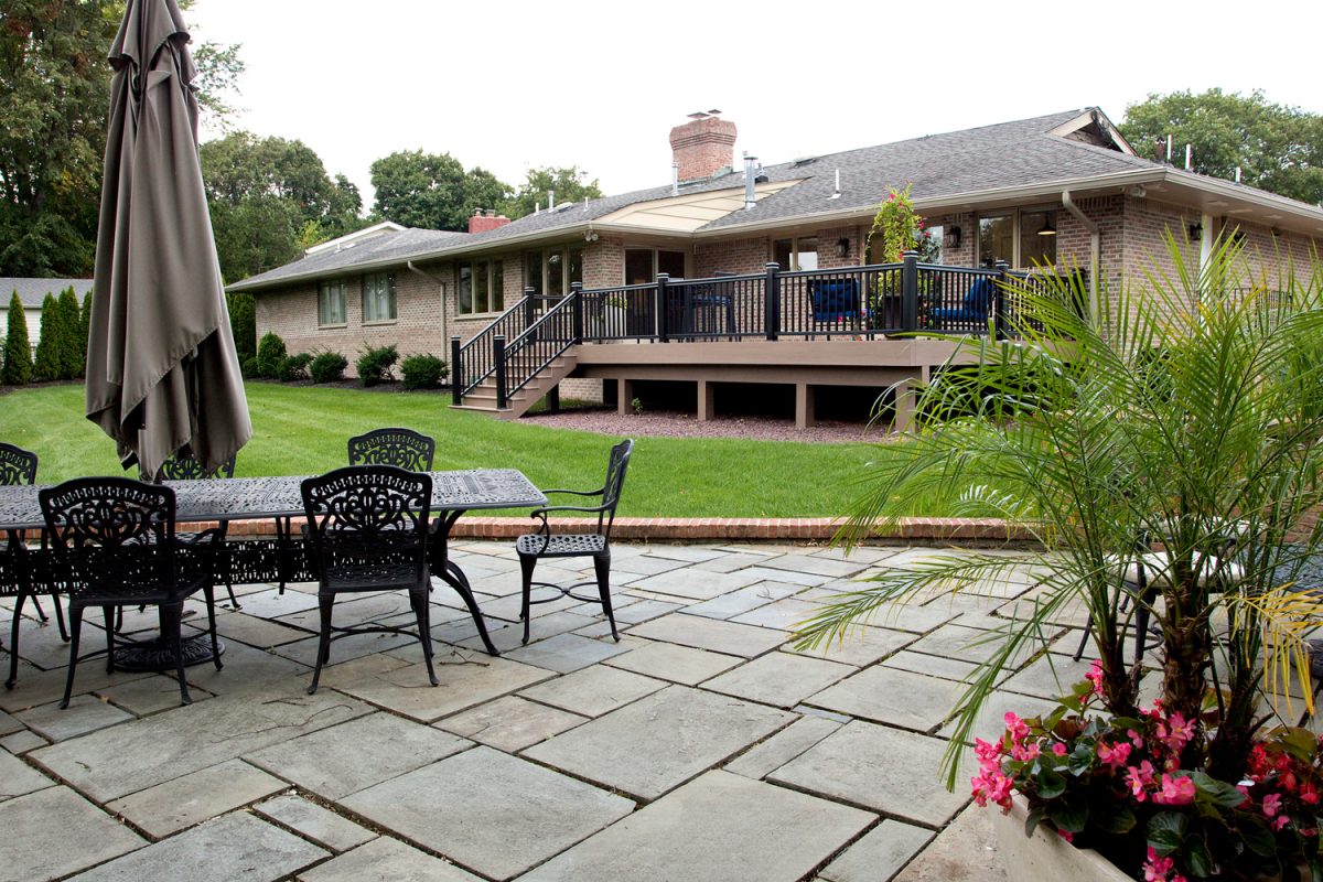 Patio and deck of modern style ranch house