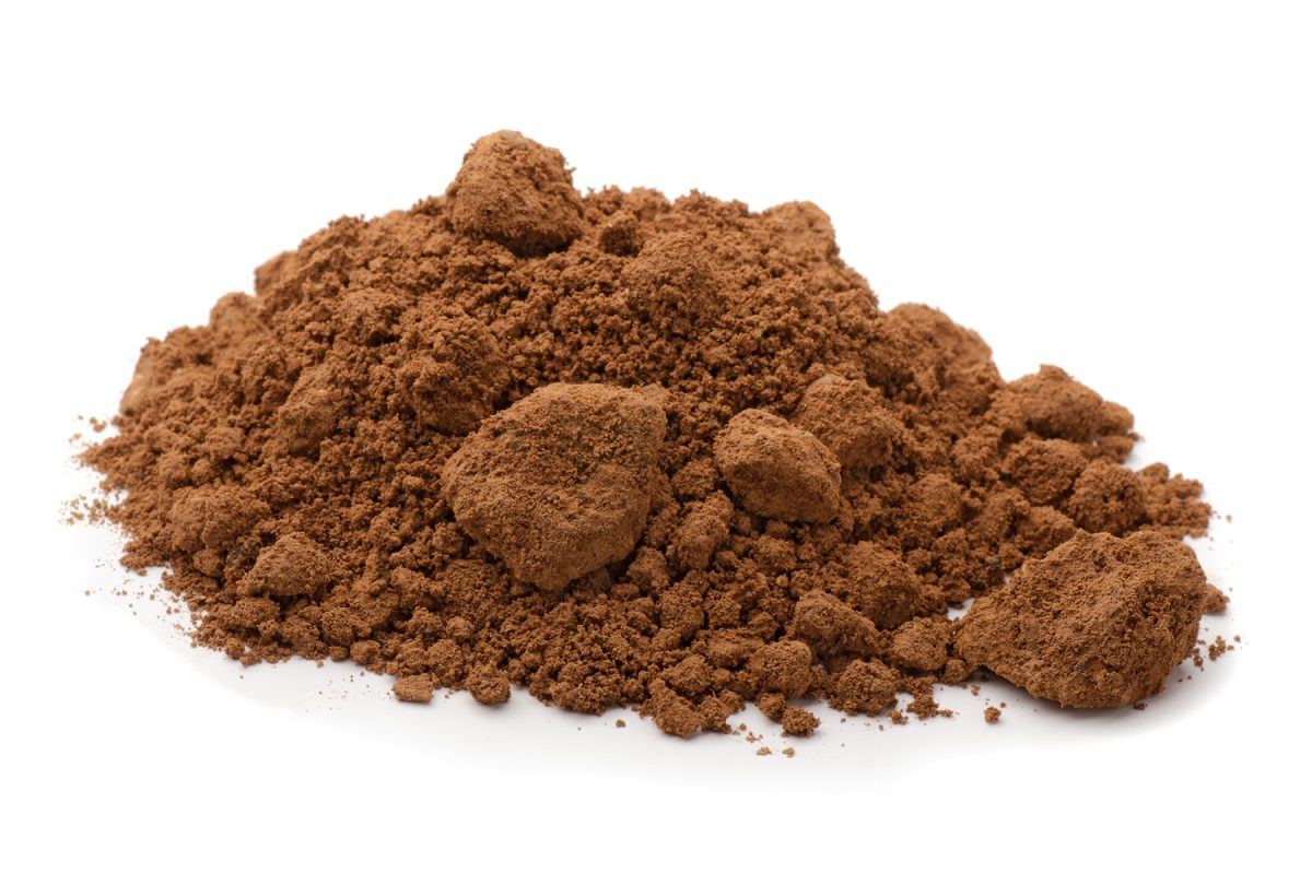 Pile of brown raw clay isolated on white

