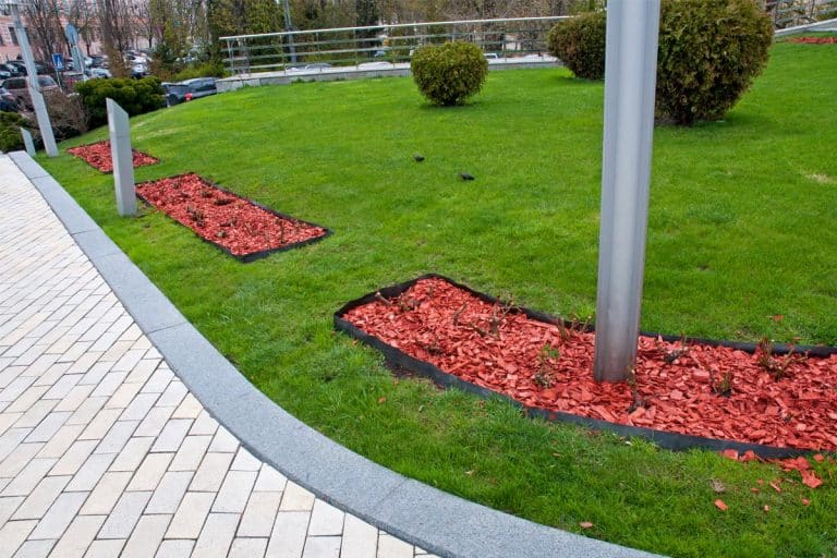 A rubber edging strips on recreation areas near architectural buildings, Can You Paint Rubber Landscape Edging?