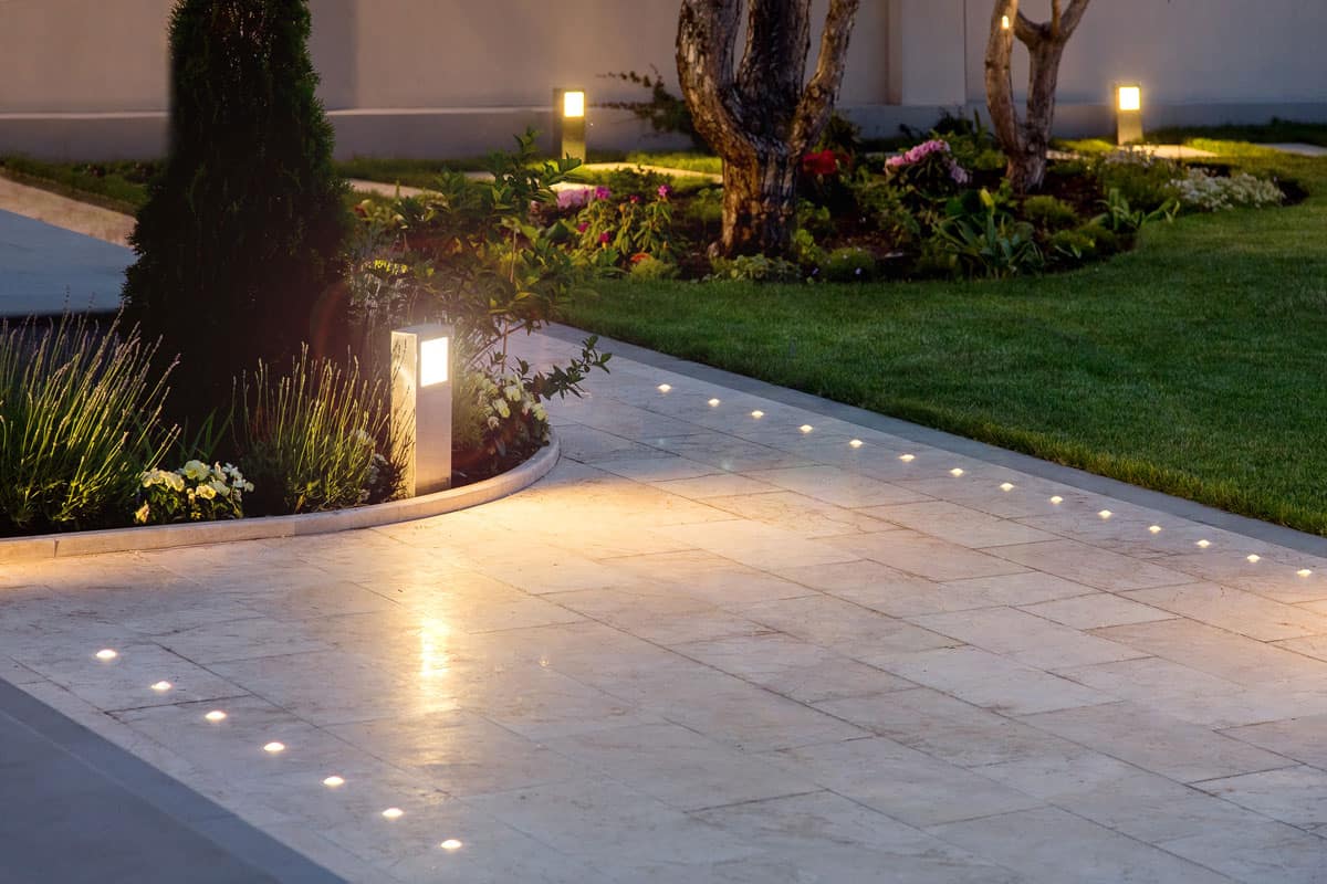 Ultra modern designed landscaping of a garden with solar lights scattered on the path walk