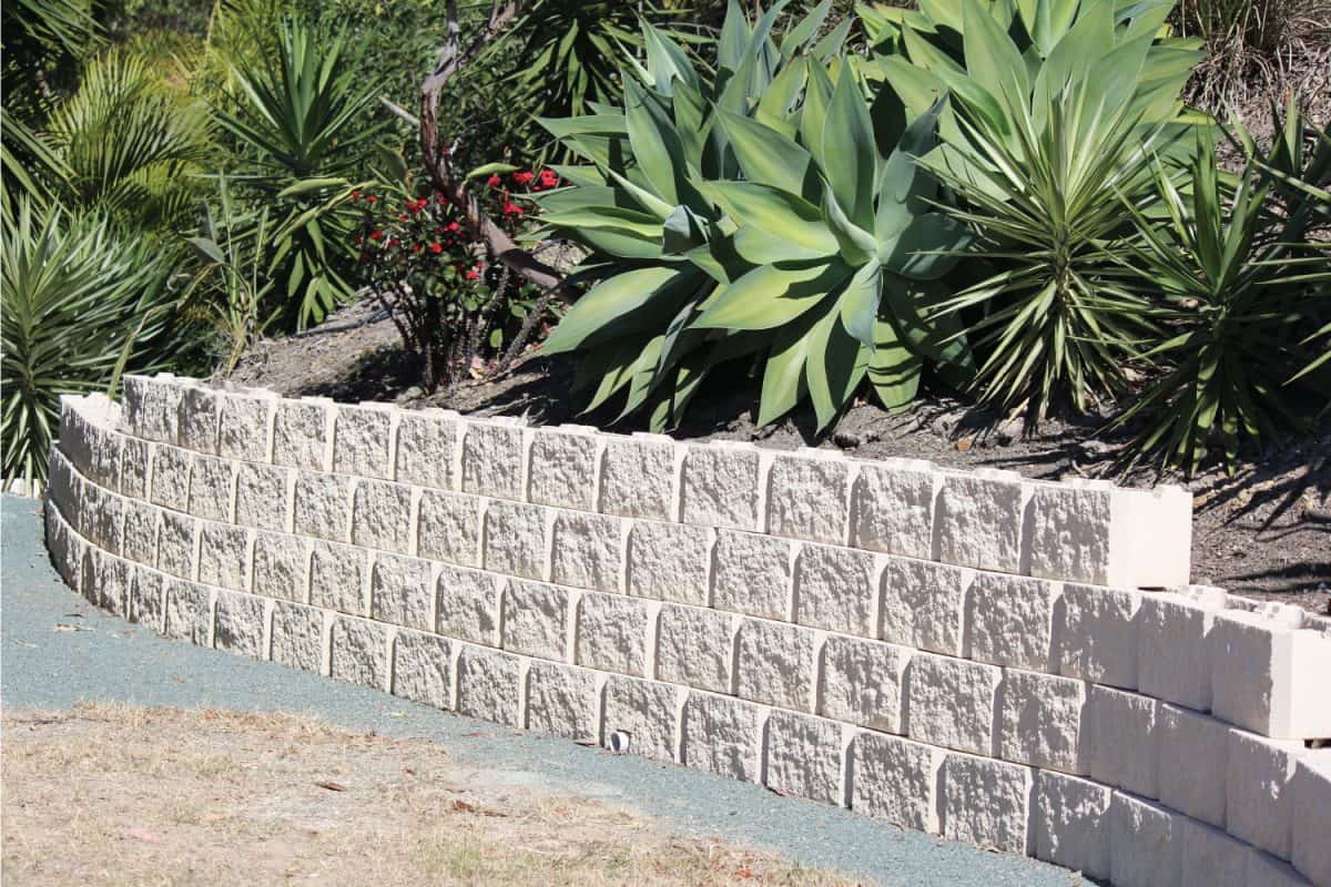 sandstone like block used as retaining wall in a garden