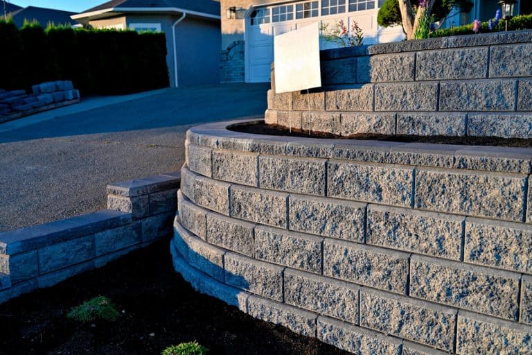 wonderful photo of a nice retaining wall on the side of the house driveway, How To Join Or Merge Two Retaining Walls